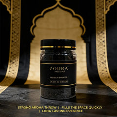 Zoura Parfums bakhoor container with decorative background