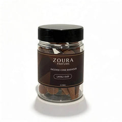 Jar of Zoura Parfums incense cones on a white background