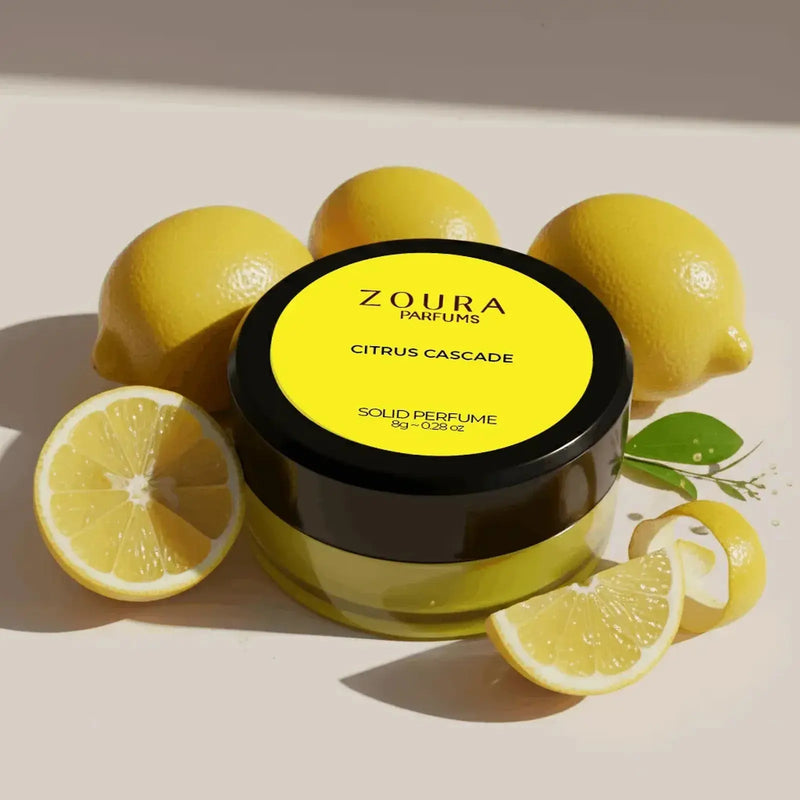 Zoura Citrus Cascade Solid Perfume with fresh lemons