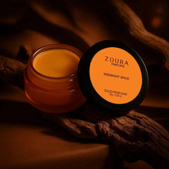 Zoura Midnight Spice Solid Perfume open jar with balm texture