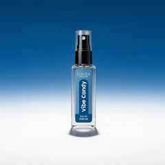 Zoura Parfums 'vibe candy' perfume bottle on a blue gradient background
