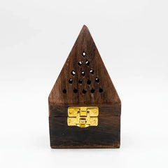 Wooden bakhoor burner with a gold latch on a white background