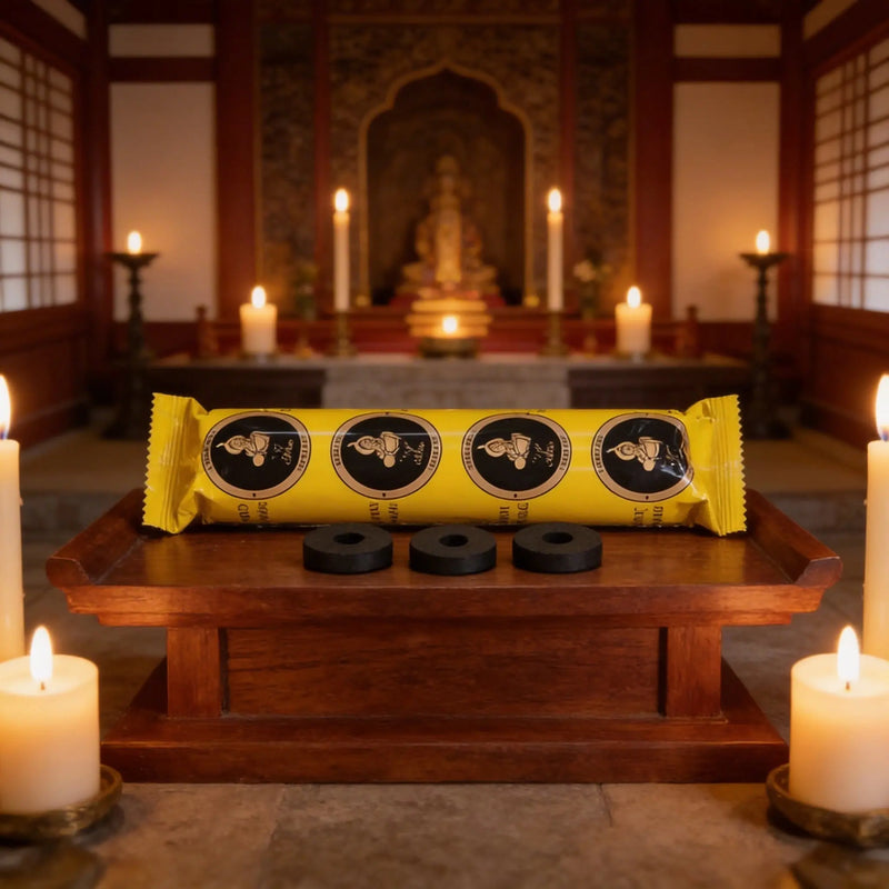 Zoura quick-lighting charcoal tablets displayed at a Hindu temple
