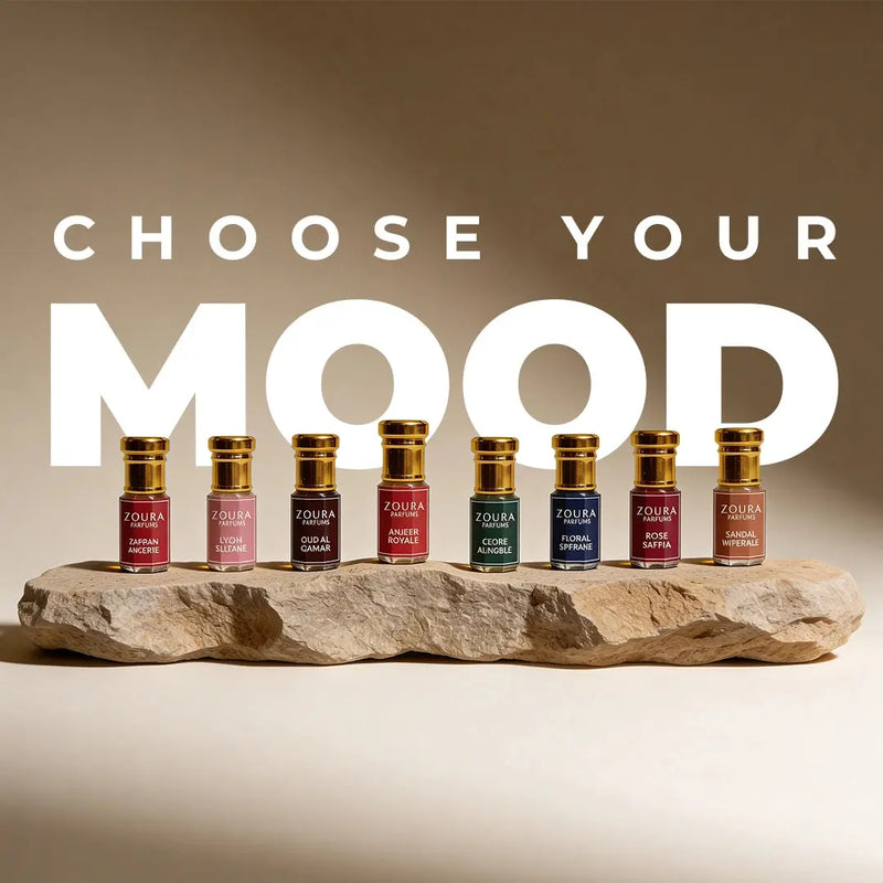 Zoura Parfums "Choose Your Mood" attar collection lineup including Anjeer Royale on a stone display