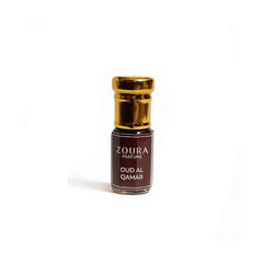 Zoura Parfums Oud Al Qamar attar bottle with gold cap on white background