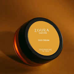 Zoura Oud Cream Luxury Unisex Solid Perfume jar on golden amber backdrop