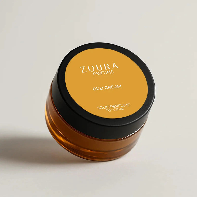 Zoura Oud Cream Luxury Unisex Solid Perfume amber jar on neutral beige background