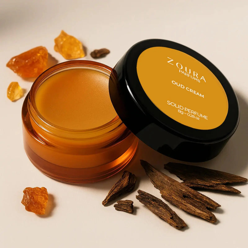 Open jar of Zoura Oud Cream Luxury Unisex Solid Perfume with oud wood and amber resin