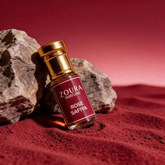 Rose Safiya jasmine attar bottle on red sand with rocks - Zoura unisex attar
